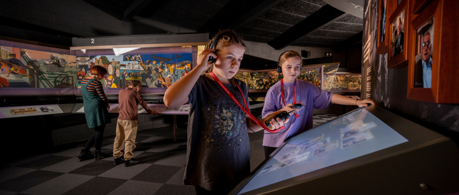 Two children look at exhibits in the D-Day Story